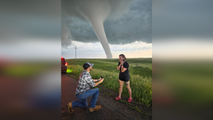 See it: Storm chasing couple becomes engaged in front of South Dakota tornado
